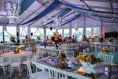 An event in the Aquarium's Harbor View Tent