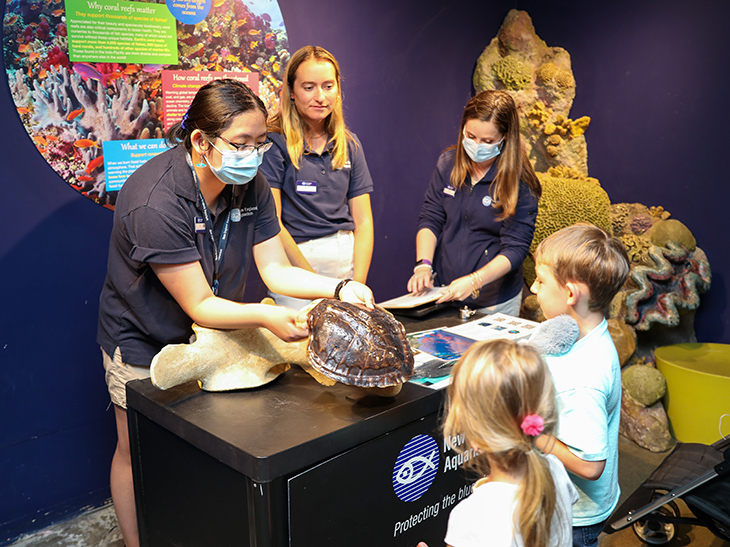 Conservation Learning staff talk to guests about Marine Protected Areas.