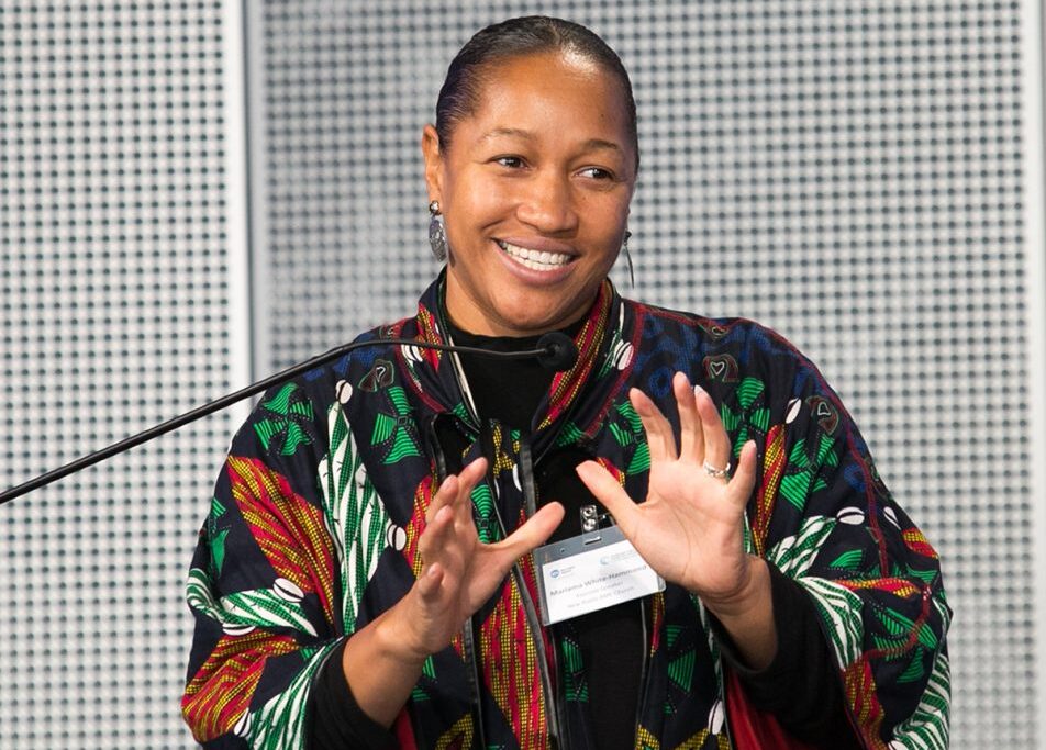 Woman speaking at a podium