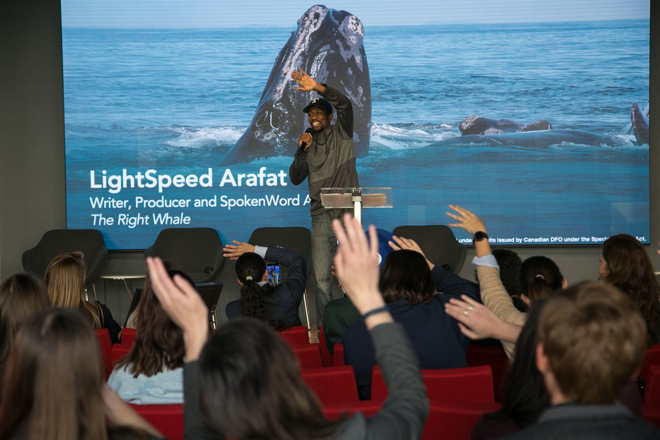 Man giving a presentation on stage