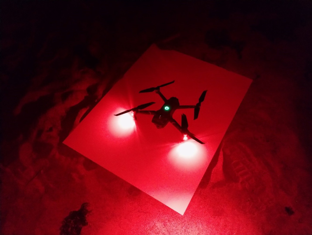 Drone ready to takeoff for a night mission.