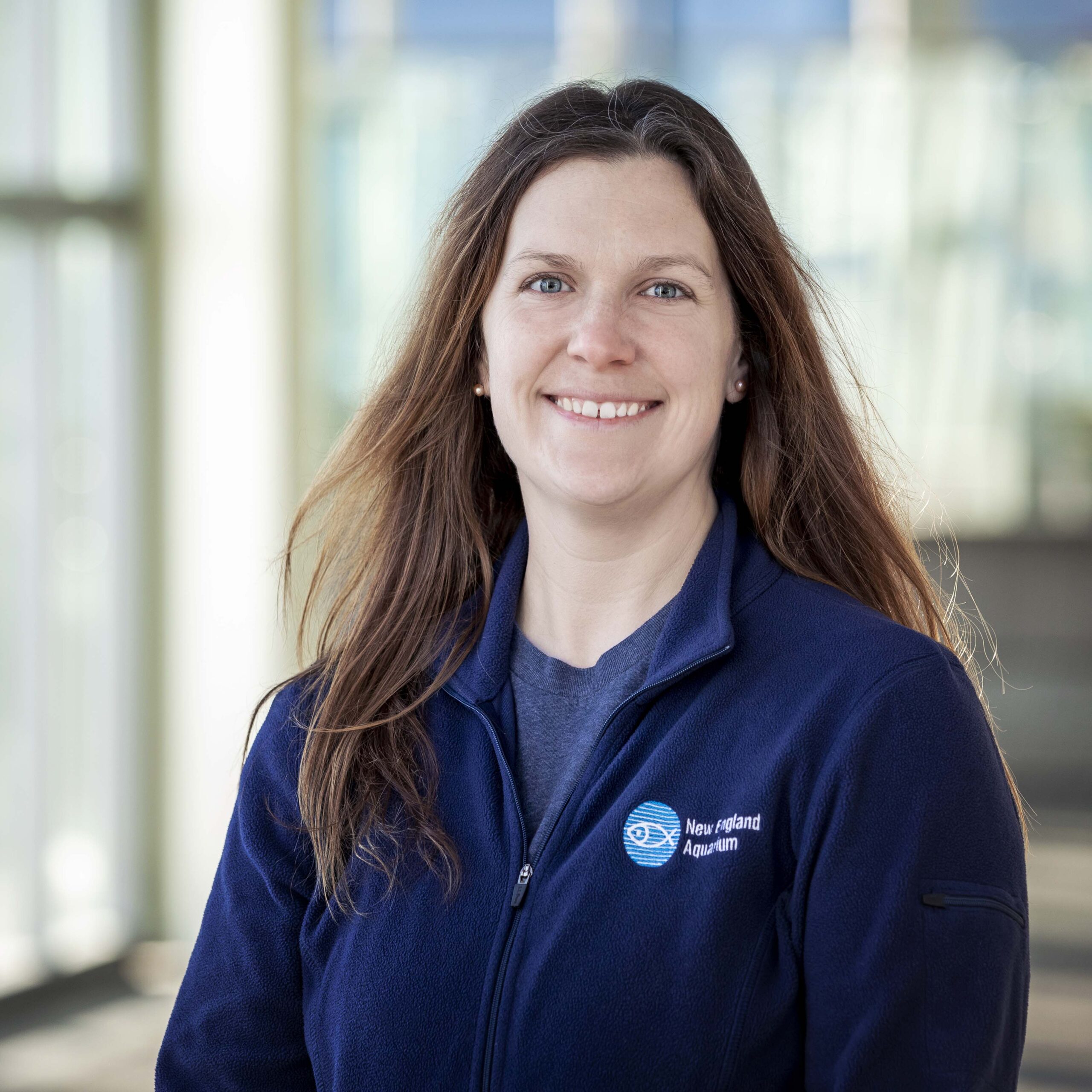 Staff member of the New England Aquarium's Marine Mammal Center. Photo by Caitlin Cunningham Photography.