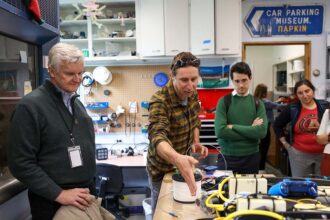 A group of people in a research lab