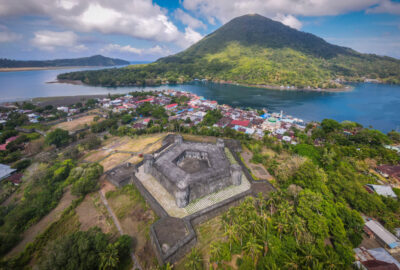 Aerial view of Banda Naira with the Fort of Belgica in the center, overlooking Gunung Api