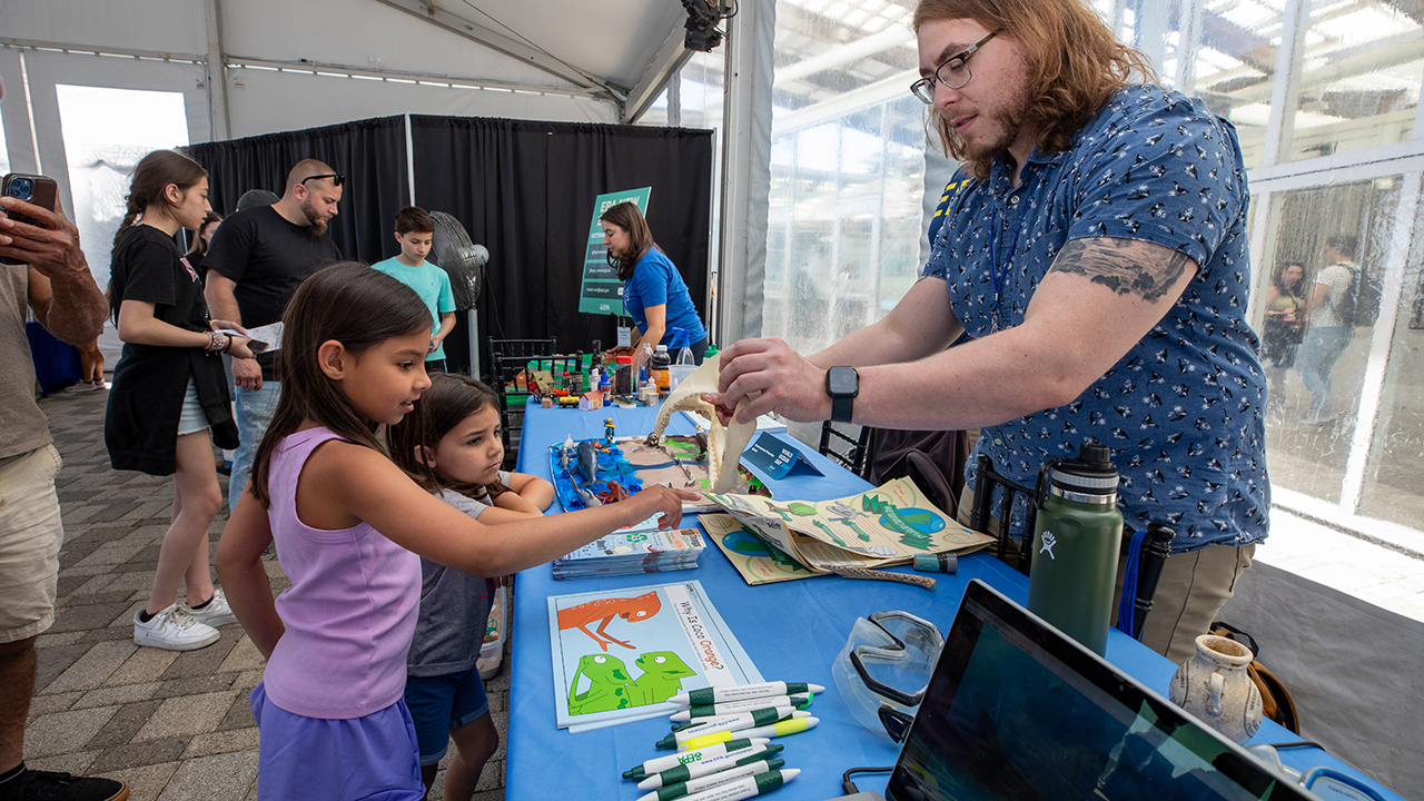 Visitors engaging with Aquarium staff during World Ocean Day