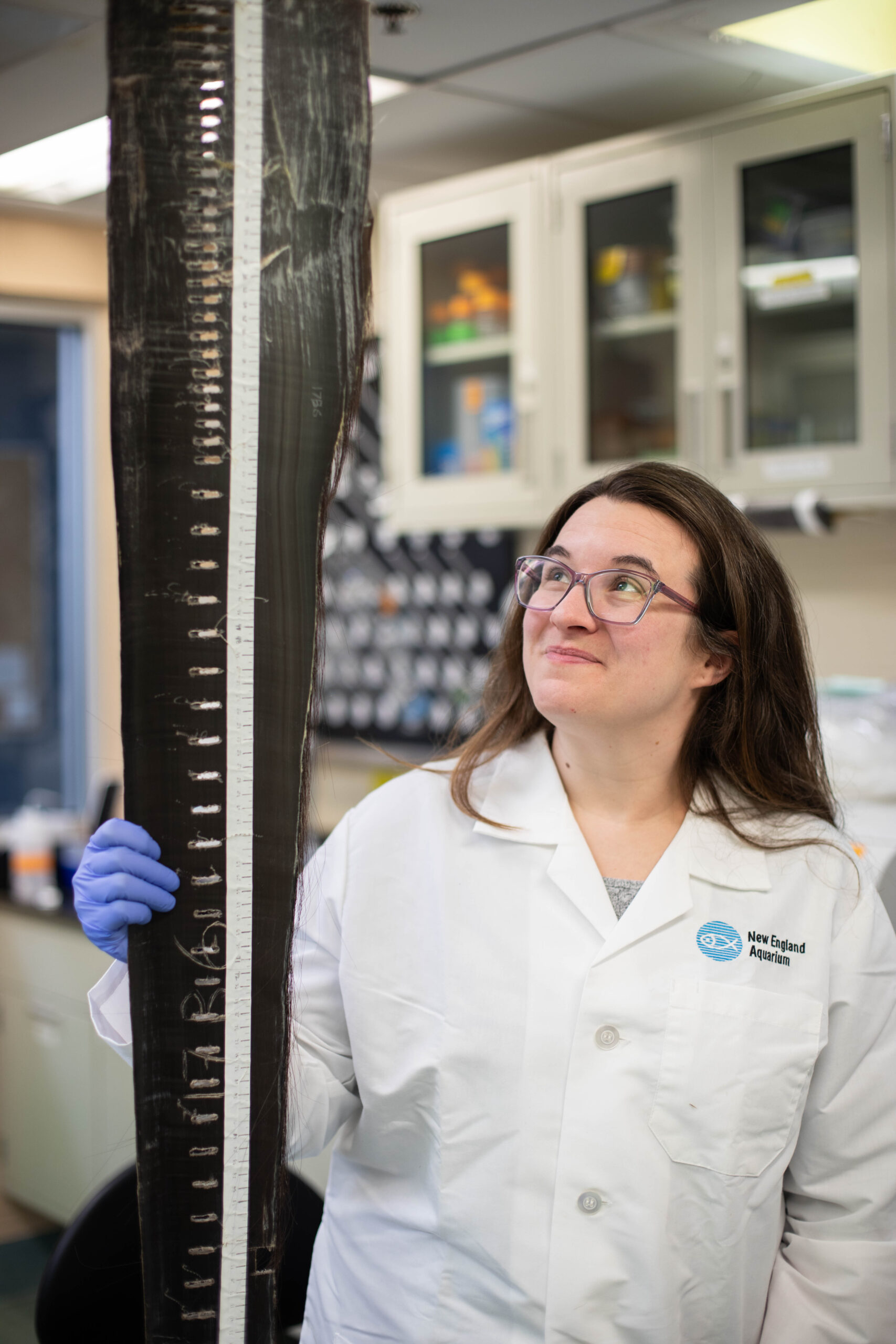 Danielle Dillon poses with a baleen sample.