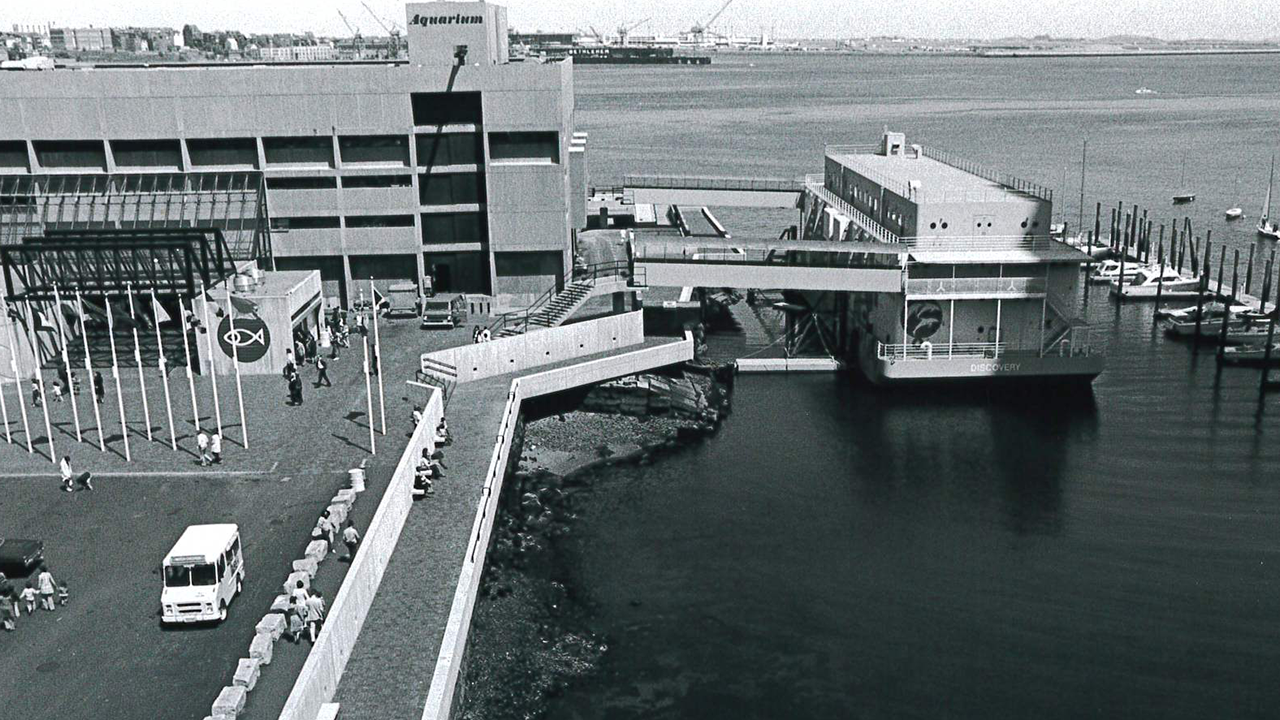 The Discovery docked outside the Aquarium