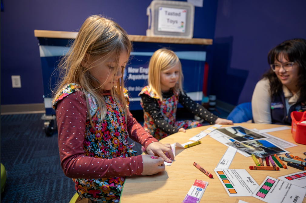 Young guests participate in an activity