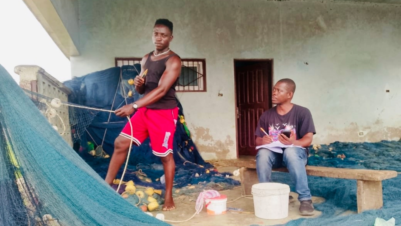 Two fisherman being interviewed