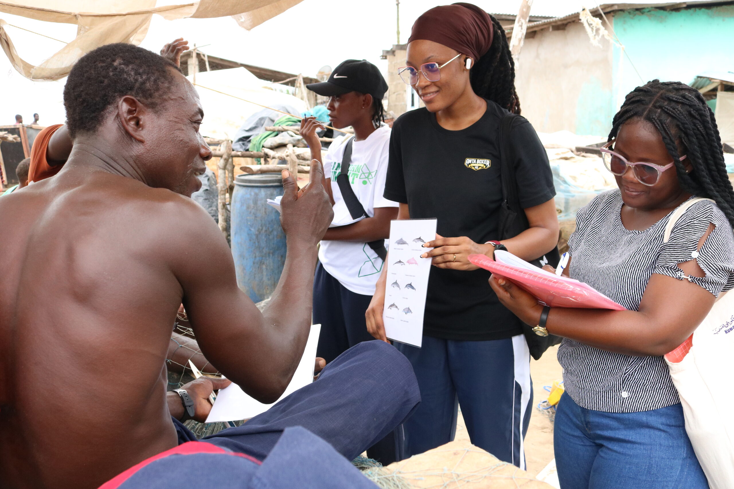 Fellowship participants interviewing fisher